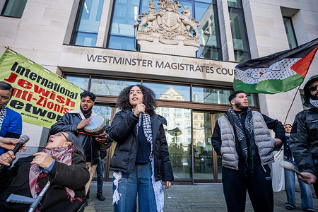 Azza Zaki, 60, Haya Adam, 21 and Abdallah Alanzi, 24, arrive at Westminster Magistrates Court to attend the first court case of its kind over the use of the word ‘Intifada’. The three pro-Palestinian activists are being charged of stirring up racial hatred, under section 18 of the Public Order Act, by chanting for an intifada in an organised protest outside the Ministry of Justice last year.