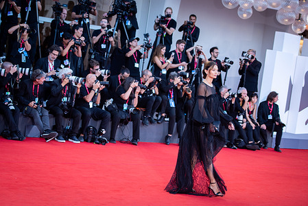 A guest attends "The Smashing Machine" red carpet during the 82nd Venice International Film Festival.
