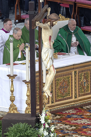 Cardinal Robert Francis Provost co-celebrates with Pope Francis a mass for the jubilee of the armed forces at St. Peter's Square.