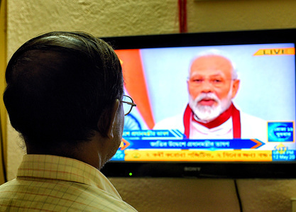 Indian Prime Minister, Narendra Modi speaking to the Nation about Covid19 crisis on a television set.
Prime Minister, Narendra Modi has announced a special economic package worth Rs 20 lakh crore INR / USD 300 Billion to help the nation fight the Covid-19 pandemic.