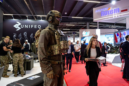 Visitors walk the aisle during the 33rd International Defence Industry Exhibition (MSPO). The Expo attracted 811 exhibitors from 35 countries.