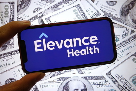 In this photo illustration, an Elevance Health company logo is seen displayed on a smartphone screen.