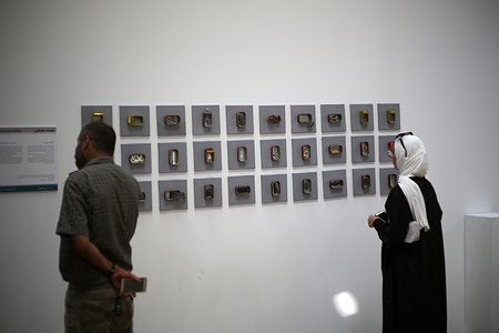 Palestinians look at the artworks during a contemporary art exhibition. The International Committee of the Red Cross organized a contemporary art exhibition titled "Fenced off " by Palestinian Visual artists in Gaza city. The artists participated in the exhibition with their artworks presenting and expressing the challenges they are facing due to the closure of the Gaza strip by Israel. Also, it displays the repercussions of the Israeli blockade and the restrictions imposed on the residents for more than 15 years.