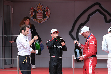 Tommaso Volpe, Nissan Formula E Team Principal (L), Nyck De Vries of the Mahindra Racing (C) and Oliver Rowland of the Nissan Formula E Team (R) celebrate on podium of Race Round 6 of the ABB Formula E World Championship - 2025 Monaco E-Pix. Oliver Rowland of the Nissan Formula E Team wins the Race 6 of Monaco E-Pix 2025. In the second position is Nyck De Vries of the Mahindra Racing and in third is Jake Dennis of the Andretti Formula E. Tommaso Volte, Nissan Formula E Team Principal, collects the trophy for the team.