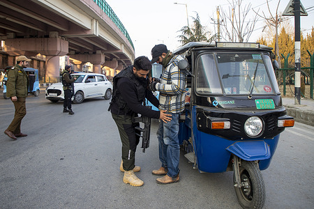 Special Operations Group (SOG) of Jammu and Kashmir police personnel frisks a rickshaw driver during a random search operation ahead of India’s Republic Day in Srinagar. Authorities across Indian administered Kashmir have increased security measures ahead of the 77th Republic Day on January 26 to prevent any disruptive activities, including stringent vehicle inspections and intensified surveillance using drones and high resolution CCTV cameras to monitor movement in real time. The heightened alert follows a gunfight in a remote forested area in the upper reaches of Jammu and Kashmir’s Kishtwar district, where at least eight Indian soldiers were injured during a fierce gunfight with suspected militants on Sunday, according to officials. Security operations have been further intensified in the run up to Republic Day, which commemorates the adoption of India’s constitution on January 26, 1950.