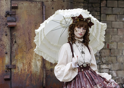 A woman wearing steampunk costumes is seen during "VI KyivSteamCon" event in Kiev.The Steampunk festival involving workshops, talks, competitions, dances and lectures attracts fans of subgenre steampunk, cosplay and science fiction.