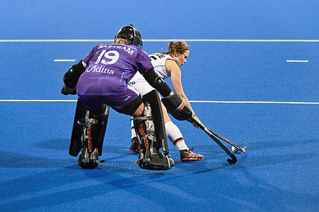 Jocelyn Bartram (L) of Australia Women's National Field Hockey Team and Viktoria Huse (R) of Germany Women's National Field Hockey Team in action during the International Hockey Federation Pro League Australia Vs Germany game held at the Sydney Olympic Park Hockey Centre.
Final score: Germany 2:1 Australia (penalty shootout)..