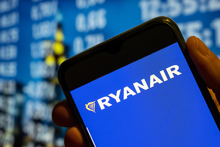 In this photo illustration, the Irish low-cost airline Ryanair logo is displayed on a smartphone screen.