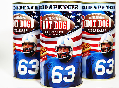 In this photo illustration, canned Bud Spencer Bulldozer Hot Dog sausages (Hot Dog Würstchen) featuring the American flag and an image of Bud Spencer seen on a white background.