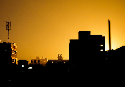 An explosion is seen in northern Gaza City after an airstrike by Israeli forces. Israeli fighter jets hit 25 targets in the Gaza Strip early June 20 in response to rocket fire from the Palestinian territory, the army said.