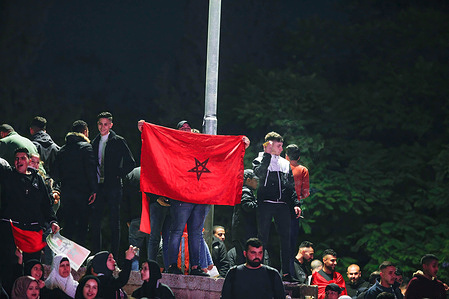Palestinians supporting Morocco's national team watch the Qatar 2022 World Cup match between Croatia and Morocco, in the occupied West Bank city of Nablus.