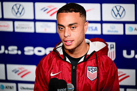 Sergiño Dest of the United States men's national soccer team speaks during a press conference at the Great Park Sports Complex training site.