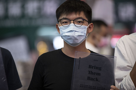 Pro-democracy activist and politician Joshua Wong participates in a demonstration in Hong Kong.