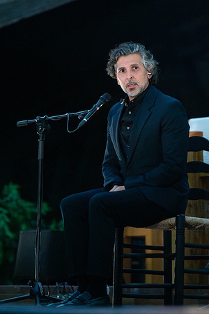The singer Jose Arcángel Ramos, known as Arcangel, performs during the concert at the parish of Our Lady of Guadalupe in Madrid.