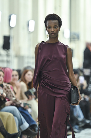 A model walks the runway wearing a design by Isabel Sanchis during the Mercedes-Benz Fashion Week de Madrid in IFEMA.