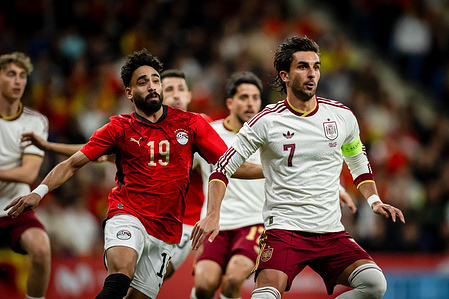 Ferran Torres of Spain and Marwan Attia of Egypt seen during a friendly match between Spain and Egypt at RCDE Stadium. Final Score: Spain 0 - 0 Egypt