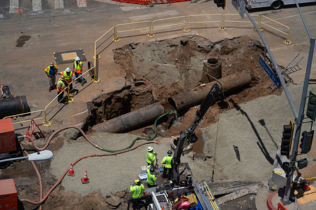 A water pipe bursts in West Hollywood, California causing a sink hole on Sunset boulevard. Water was gushing through the neighborhood after the pipe broke around 2:30 AM sending water out onto the streets for several hours.