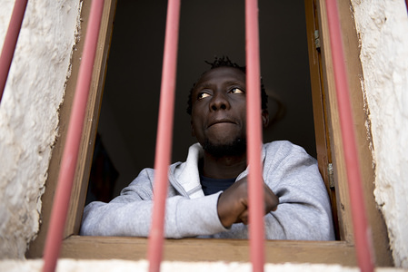 Migrant from Ghana waits inside the Red Cross building to be relocated. 
33 migrants were relocated to hostels near Motril, Granada, because of lack of space.
96 migrants were rescued by Spanish Maritime Rescue and brought at Motril port. Today more than 500 migrants were rescued and assisted while they try to cross to Spain by dinghy.