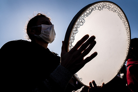 A protester is seen playing a tambourine during the demonstration.
Hundreds of women staged a protest in Istanbul against the Turkish President Recep Tayyip Erdogan's decision to quit the European treaty on violence against women.