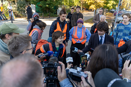 Climate activists seen holding a press conference. Climate activists blocked the streets and set up tents in front of the Polish parliament demanding the adoption of the LEX law.
