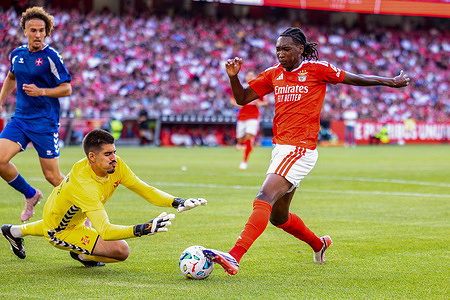 Diego Riechelmann of Belenenses and Olívio Tomé of Benfica seen in action during the friendly match between Benfica and Belenenses at Estádio da Luz. Final score; Benfica 5:1 Belenenses.