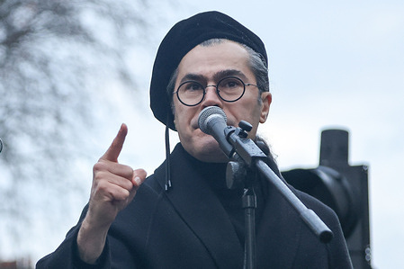 Shahkar Bineshpajooh, Iranian poet speaks as thousands of Iranian protesters rally outside Downing Street in London, calling on the UK government to support human rights and proscribe the Islamic Revolutionary Guard Corps (IRGC).