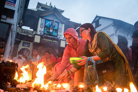 Nepalese Hindu devotees pray to Lord Shiva during the first day of the Sarwan Brata Festival, the month of fasting at a Pashupatinath Temple. Nepalese Hindu women gathered outside the temple premises to worship Lord Shiva. Each Monday of the Sawan month, women pray for a long and prosperous life for their husbands or a chance to find a good one.