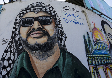 A mural depicting the late Palestinian political leader Yasser Arafat on a wall in Gaza City.
The mural was painted to mark the 16th anniversary of Yasser Arafat's death which celebrated on November 11th.