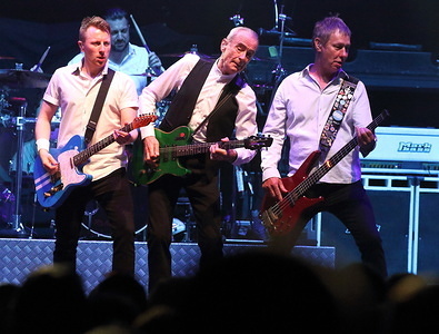 Richie Malone, Francis Rossi and John 'Rhino' Edwards on stage as Status Quo play as Special Guests on Lynyrd Skynyrd's 'Last of the Street Survivors Farewell Tour' at SSE Wembley Arena