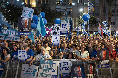 People attend a rally in memory of Israeli Prime Minister Yitzhak Rabin, who was assassinated thirty years ago for his efforts to promote peace. A rally commemorating former Israeli Prime Minister Yitzhak Rabin, who was assassinated for signing the Oslo Accords with the Palestinians in an effort to achieve peace. More than 150,000 people attended the rally calling for peace and for the replacement of the government.
The second was the weekly demonstration at the Hostages Square where large crowds gathered to demand the return of all the bodies of the hostages held by Hamas as part of a deal to end the war.