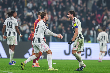 (R-L) Manuel Locatelli of Juventus FC celebrates the victory at the end of the match with Daniele Rugani of Juventus FC during Serie A 2025/26 football match between Juventus FC and AS Roma at Allianz Stadium.