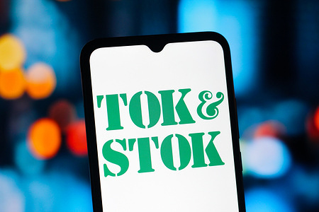 In this photo illustration, the Tok&Stok (Tok Stok) logo is seen displayed on a smartphone screen.