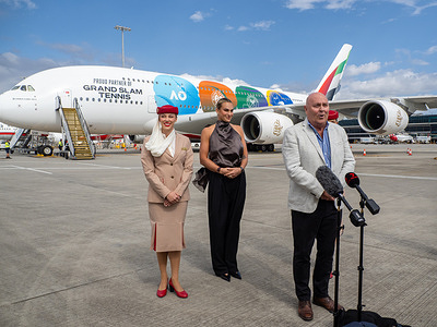 Emirates Australasia vice president Barry Brown address media with Aryna Sabalenka in front of Tennis Grand Slam livery Airbus A380. Aryna Sabalenka of Belarus, ranked number one in the world, arrives at Melbourne Tullamarine International Airport for the Australian Open, announcing partnership with Emirates Airlines.