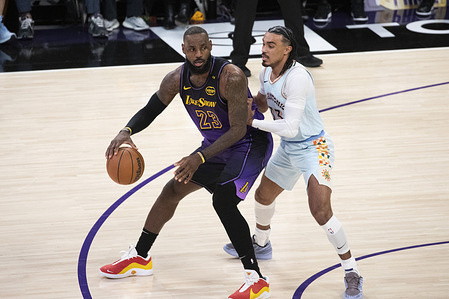 Los Angeles Lakers' LeBron James #23 is defended by San Antonio Spurs' Tre Jones #33 during an NBA basketball game at Crypto.com Arena. Final score; Spurs 126:102 Lakers