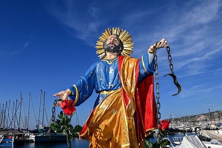 General view of the statue of Saint Peter in Chains (Saint Pierre Es Liens in French) during mass at the port of L'Estaque. Traditional procession of Saint Peter in Chains (Saint Pierre Es Liens in French) in the L'Estaque neighborhood of Marseille, France.