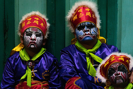 Dancers prepare before performing the traditional Yingge dance during the Vegetarian festival at Chinatown in Bangkok. Yingge dance or Engkor, a form of Chinese folk dance, is popular in Teochew, a region in the east of Guangdong, China. The Yinnge dance combines martial arts, dramatic dance and is one of the most representative forms of folk arts in the Teochew region.