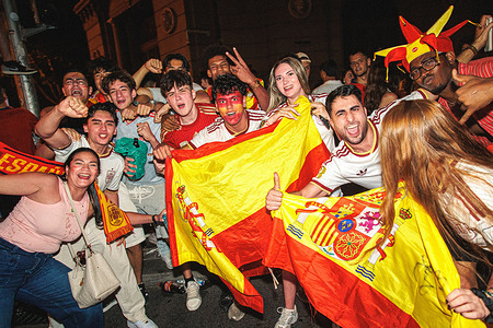 Fans wave flags as they celebrate Spain's FIFA World Cup 2026 victory over Argentina along the streets of Madrid. Final scores; Spain 1- 0 Argentina.