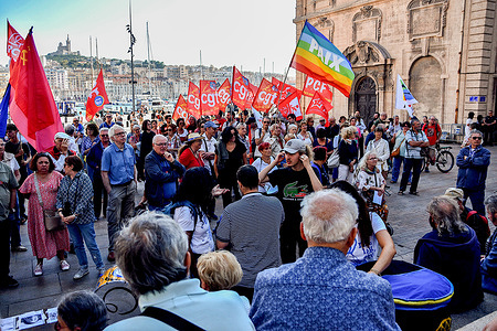 Peace protesters listen to speeches during the peace rally. At the call of the Bouches-du-Rhône Peace Movement, around a hundred people gathered on Place Bargemon in Marseille, on the occasion of the International Day of Peace.