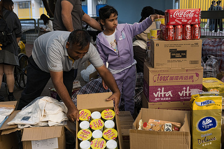 The South Asian community has set up a distribution point for emergency supplies. On Wednesday 26th November, a tower in Wang Fuk Court, which is an eight-tower complex in Tai Po, Hong Kong caught fire, while the complex had been under renovation, the towers were clad in bamboo scaffolding and mesh, it led to the rapid spread of the deadly fire to the other six towers. The incident soon escalated to Level 5 fire, for the first time in 17 years. After an overnight rescue operation by firefighters and police force, the fire was reportedly under control. The death toll still rising following the continuation of the rescue work. Many local residents have also volunteered to allocate and deliver emergency supplies to displaced residents of the complex.
