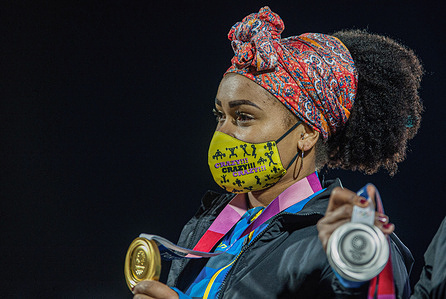 Neisi Dajomes shows off her gold medal in front of supporters at the Atahualpa Olympic Stadium in Quito.Ecuadorians celebrate the return of three weightlifters who won two medals and one Olympic diploma in the Tokyo 2020 Olympics, they were welcomed by authorities and supporters at the Atahualpa Olympic Stadium.