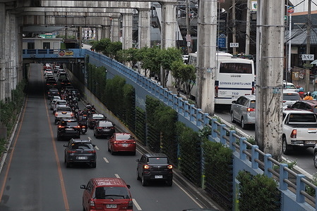 Commuters and office workers seen driving vehicles and riding motorcycles as they make their way through a business district in Manila, ahead of Philippine President Ferdinand Marcos Jr.'s State of the Nation Address (SONA), with the rising cost of living expected to dominate public attention. The annual address comes after inflation eased to 6.4% in June 2026, although it remained above the Bangko Sentral ng Pilipinas' target range of 2–4%, while the economy grew 2.8% in the first quarter. According to the Philippine Statistics Authority, the country recorded 48.89 million employed Filipinos, 2.41 million unemployed, and 7.41 million underemployed in April, as labor groups continue to press for higher wages despite the implementation of an ₱85 daily wage increase for Metro Manila minimum wage earners.