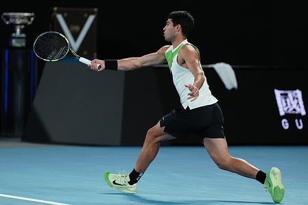 Carlos Alcaraz of Spain seen in action during the Men's Singles final match with Novak Djokovic of Serbia during day 15 of the 2026 Australian Open at Melbourne Park.