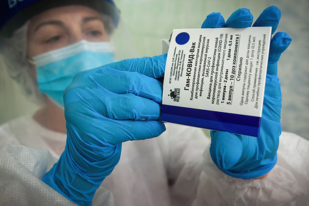 A nurse from the vaccination office of the polyclinic No. 5 in Tambov removes an ampoule from the box with the Russian vaccine against the coronavirus infection Gam-COVID-Vac (Sputnik V).According to statistics, as of August 12, 2021, 39,737,937 people (27.1% of the population) were vaccinated in Russia with at least one component of the coronavirus vaccine and 29,200,070 people (19.9% of the population) were fully vaccinated with two components. A total of 68,938,007 vaccinations were made.