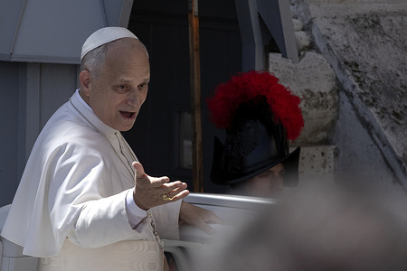 Pope Leo XIV greets the faithful from the popemobile at the end of the Eucharistic Celebration with the Canonization of Blessed Pier Giorgio Frassati and Carlo Acutis at St. Peter's Square.