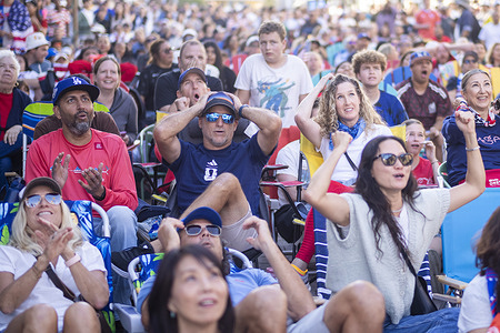 Soccer fans react while watching a live broadcast of the FIFA World Cup Round of 16 soccer match between United States and Belgium at a watch party in Santa Monica.