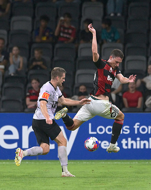 Ryan Kitto (L) of Adelaide United FC and Bozhidar Kraev (R) of Western Sydney Wanderers FC seen in action during the 2025/26 Isuzu Ute A-League Men Round 22 match between Western Sydney Wanderers FC and Adelaide United FC held at the Commbank Stadium. Final score; Western Sydney Wanderers FC 2:4 Adelaide United.