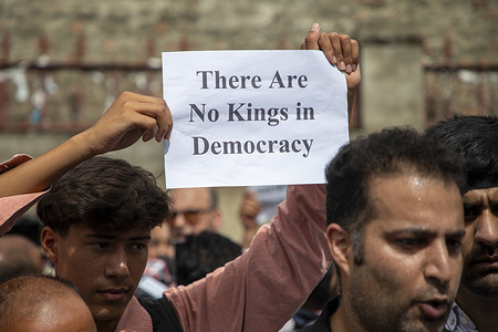 A supporter of the Indian National Congress (INC) holds a placard during a protest outside the party office demanding accountability from the government and an apology for the police crackdown on supporters of the Cockroach Janta Party (CJP). The protest was held over alleged irregularities in the National Eligibility cum Entrance Test (NEET), the country's nationwide medical entrance examination for undergraduate medical course. They called for the resignation of Education Minister Dharmendra Pradhan.