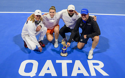 Karolina Muchova (2nd-L) of the Czech Republic celebrates with the trophy during the awarding ceremony after winning the women's singles final match against victory over Victoria Mboko of Canada of the WTA Qatar TotalEnergies Open 2026 at the Khalifa International Tennis Complex   Karolina Muchova won against Victoria Mboko 6-4,7-5. 