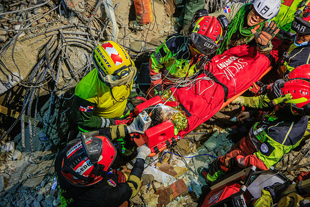 Ecuadorian and Dominican firefighters transport the rescued 12-year-old boy, Carlos, during the operations in La Guaira. The Venezuelan government declared a state of emergency and, with support from international rescue teams, launched large-scale search, rescue, and humanitarian operations following the devastating earthquakes that struck the country's northern coast. The response came after powerful earthquakes on June 24, 2026, caused widespread destruction in Caracas, La Guaira, and surrounding areas, resulting in thousands of deaths and injuries.