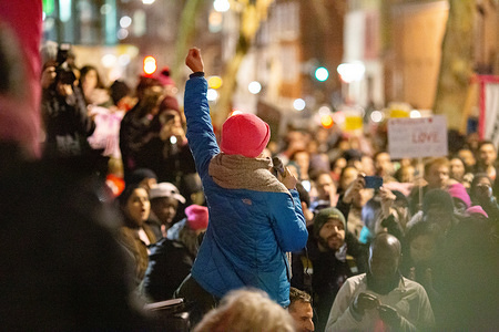 An activist seen throwing up her fist in solidarity with the 'Stansted 15' during the protest.
Protestors gathered outside the Home Office in London to display their anger at the verdict of the ‘Stansted 15’. 
The Stansted 15 are 15 political activists who blocked the takeoff of an immigration removal charter flight at Stansted Airport in March 2017. They have since been convicted of an aviation offence under anti-terror legislation.